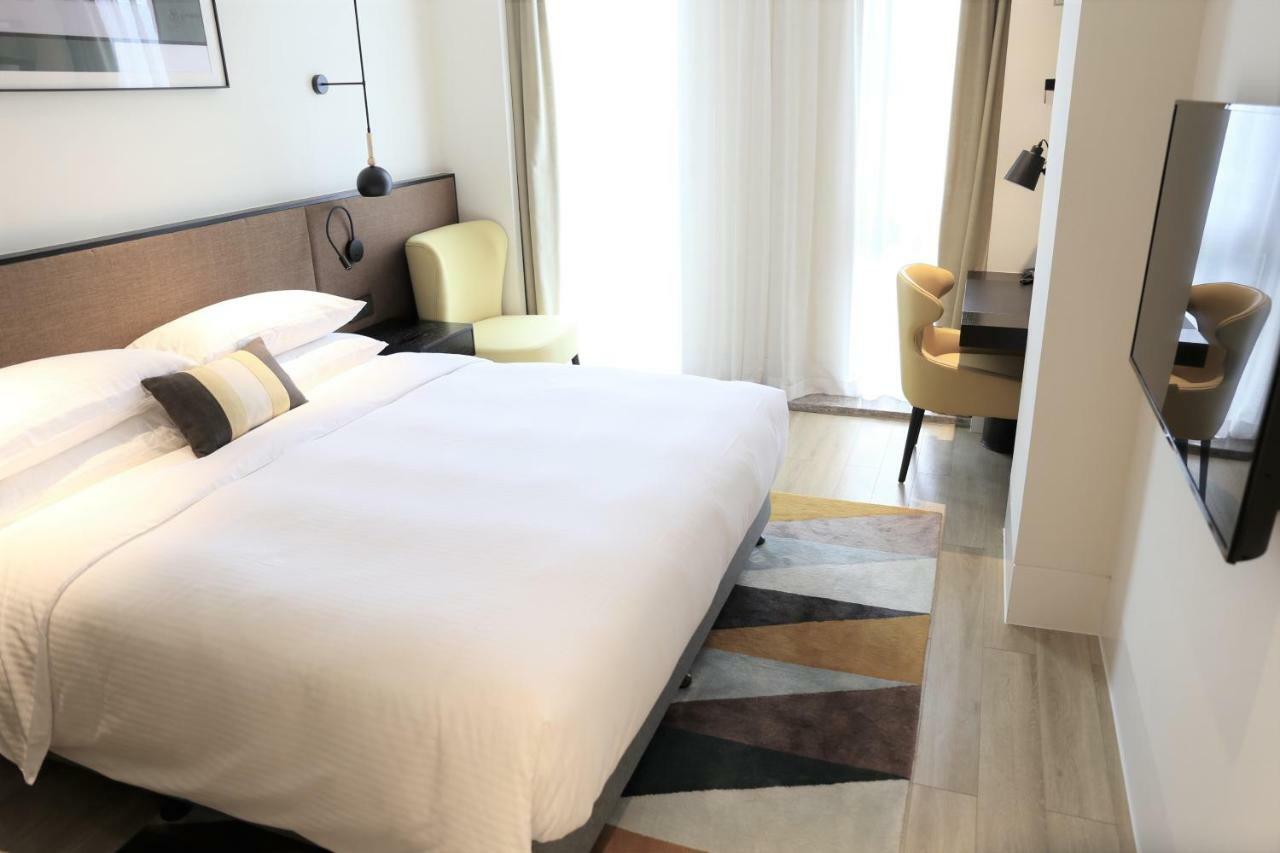Aparthotel Citadines Gaoke Liangjiang Chongqing Extérieur photo